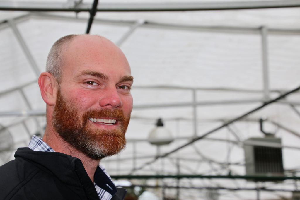 Matt Bizzell in the greenhouse. (Julie June Stewart photo)
